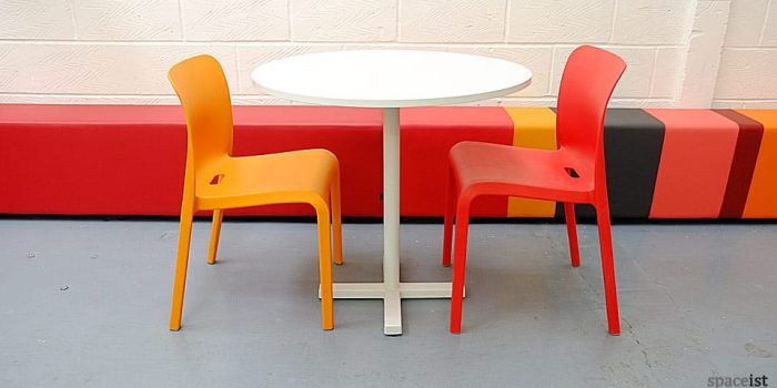 bold white round modern cafe tables