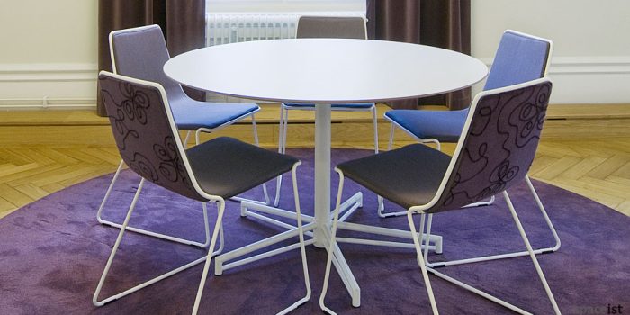 x white round meeting table