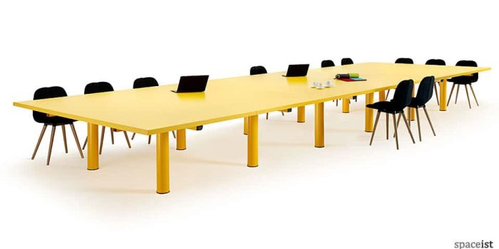Very large yellow meeting room table